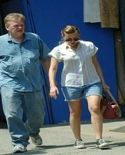 Picture of Karsten and his daughter Scarlett walking on a road